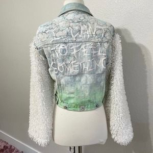 Handmade and painted denim jacket with white faux shearling sleeves